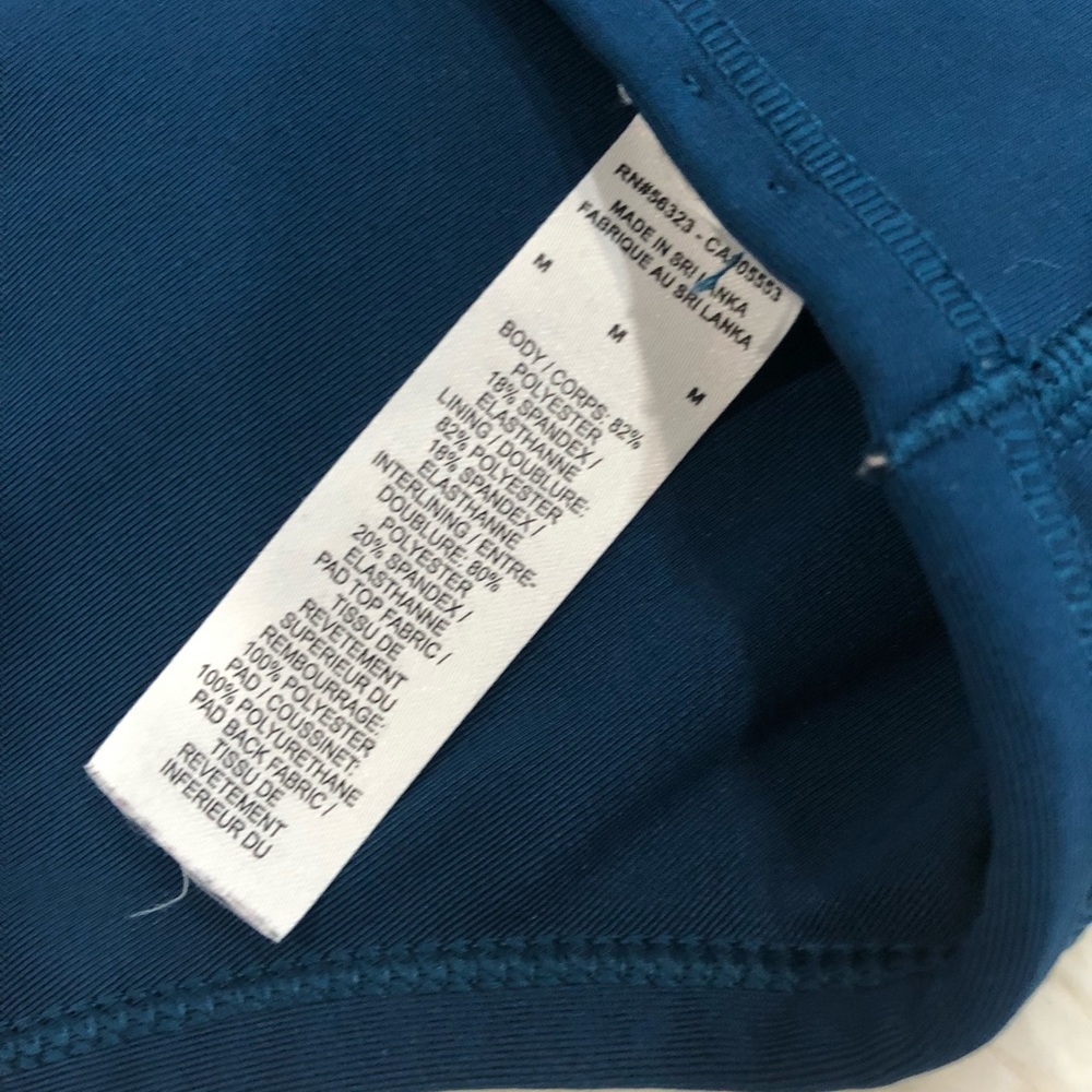 Gently worn Nike Medium bi-colored removable padding racer back sports bra - Picture 3 of 6